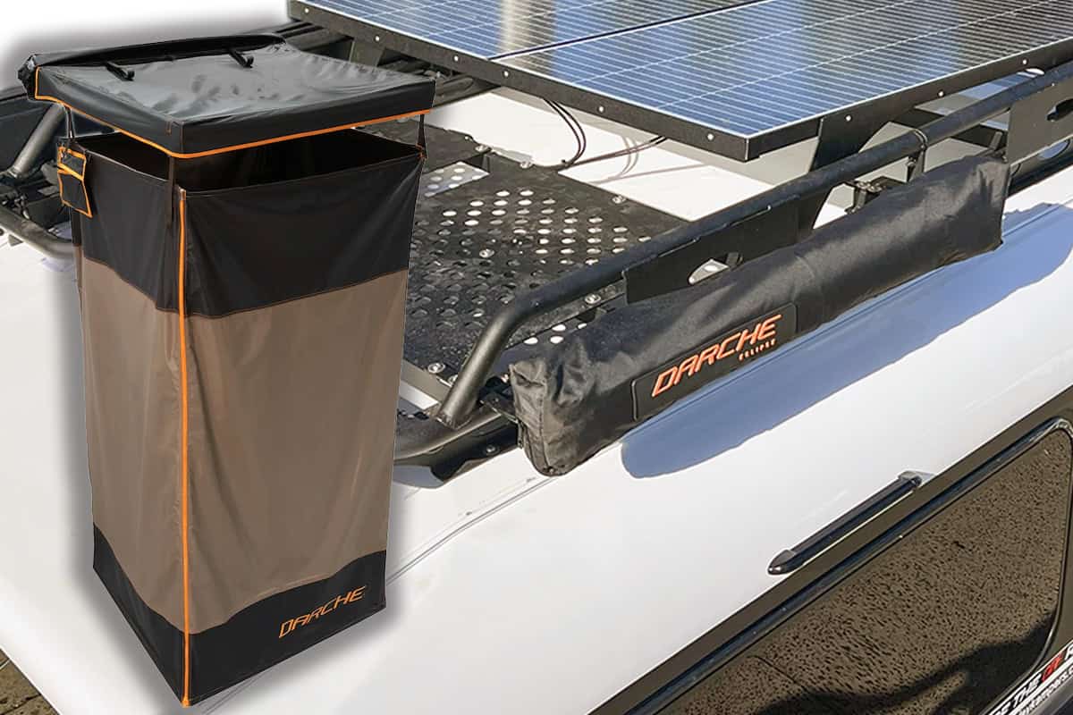 Kimberley Kampers Teardrop Kube Camper with roof rack and outdoor shower setup, showcasing a compact off-road camping solution.