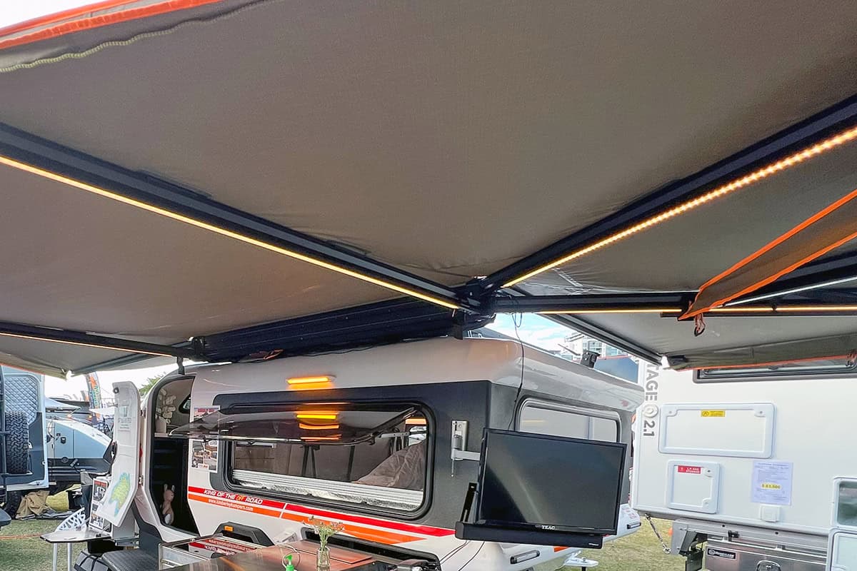 lose-up of Darche 270-degree awning with integrated LED lighting on a Kimberley Kampers camper, highlighting outdoor functionality.