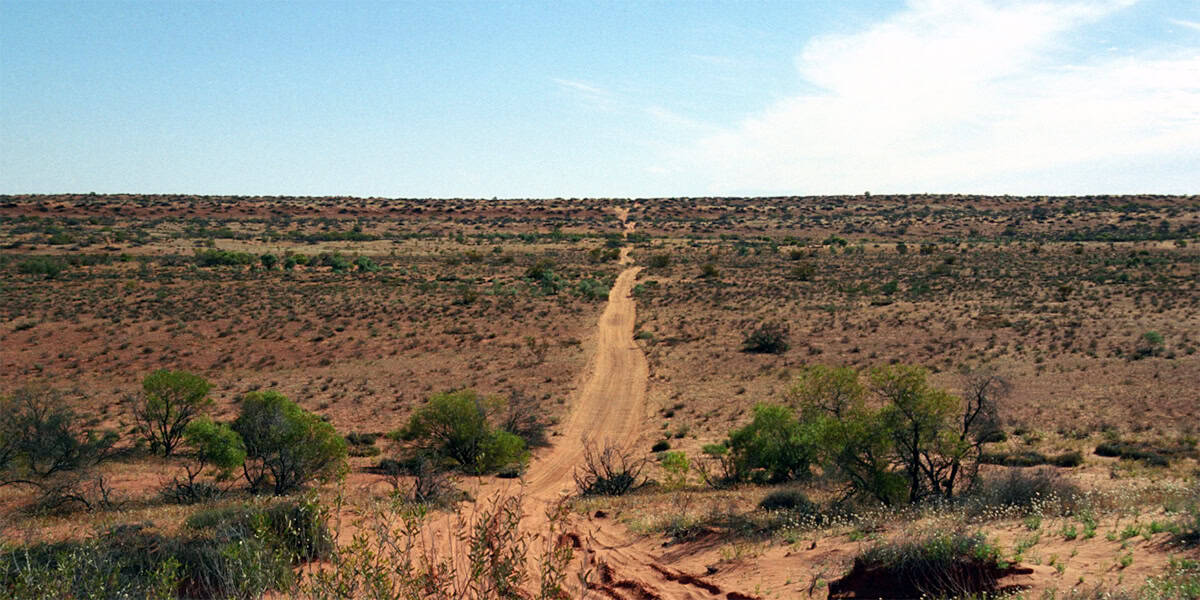 Kimberley Kampers off-road caravans belong on the Oodnadatta Track in South Australia, set against a vast desert landscape.